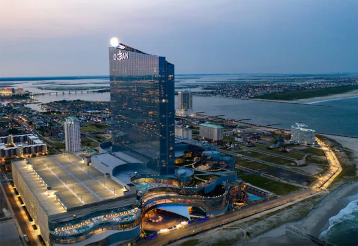 Ocean Casino Resort in Atlantic City with the Atlantic Ocean, beach, and breaking waves beside the tower